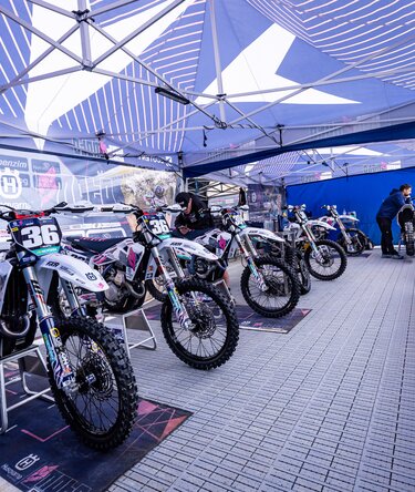 Cat Moto Motocross Team’s race bikes under Ecotent pop-up gazebos.